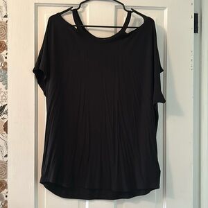 Never worn black Maette cut out shirt. Size XL